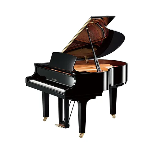 A grand piano in polished ebony with the lid raised