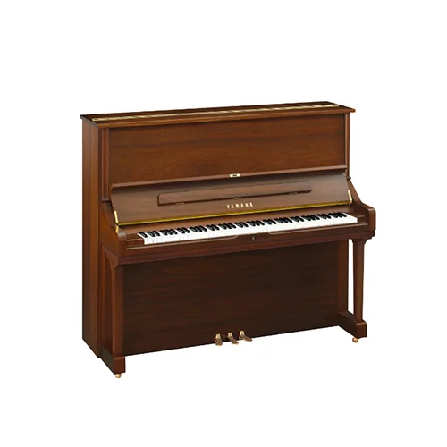 A Yamaha upright piano in a walnut finish