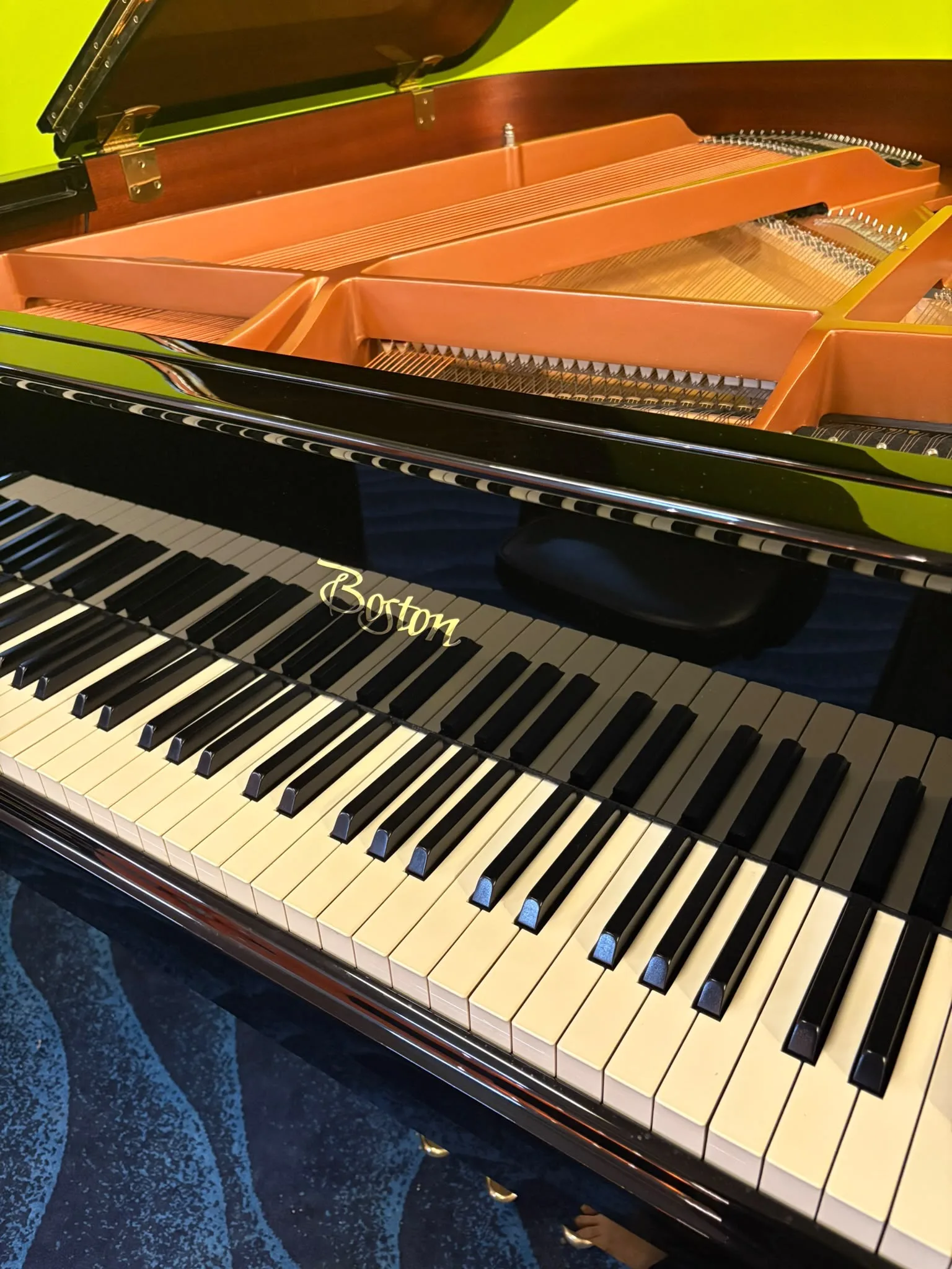 The keyboard and fallboard of a Boston grand piano