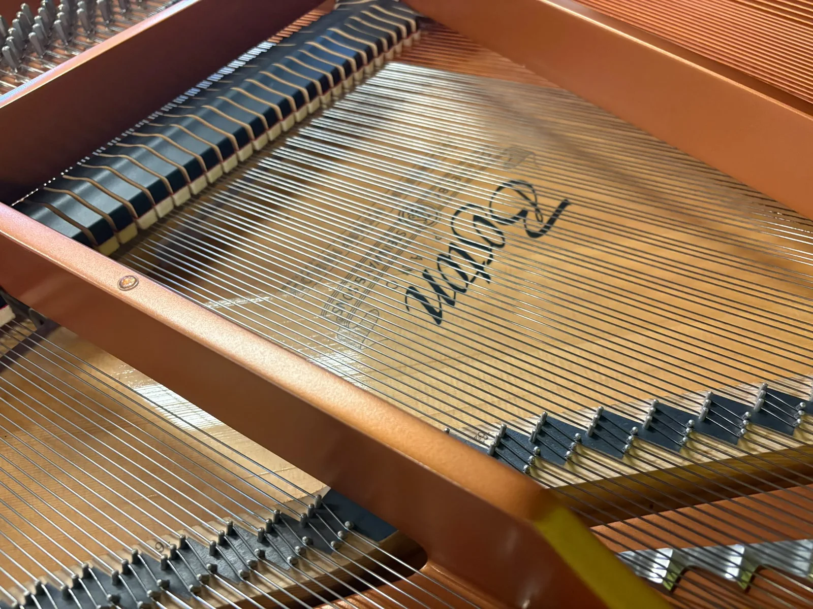 The Boston name on the cast iron plate of a grand piano