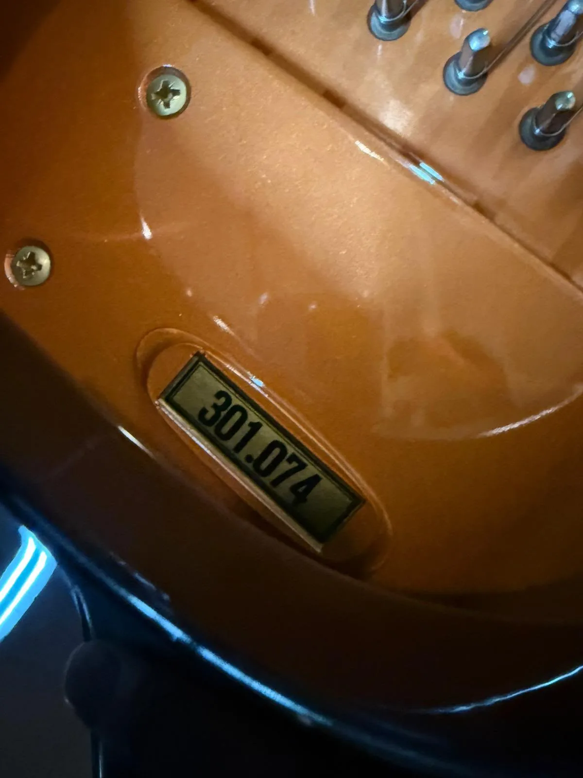 The serial number stamped on the plate of a Schimmel grand piano