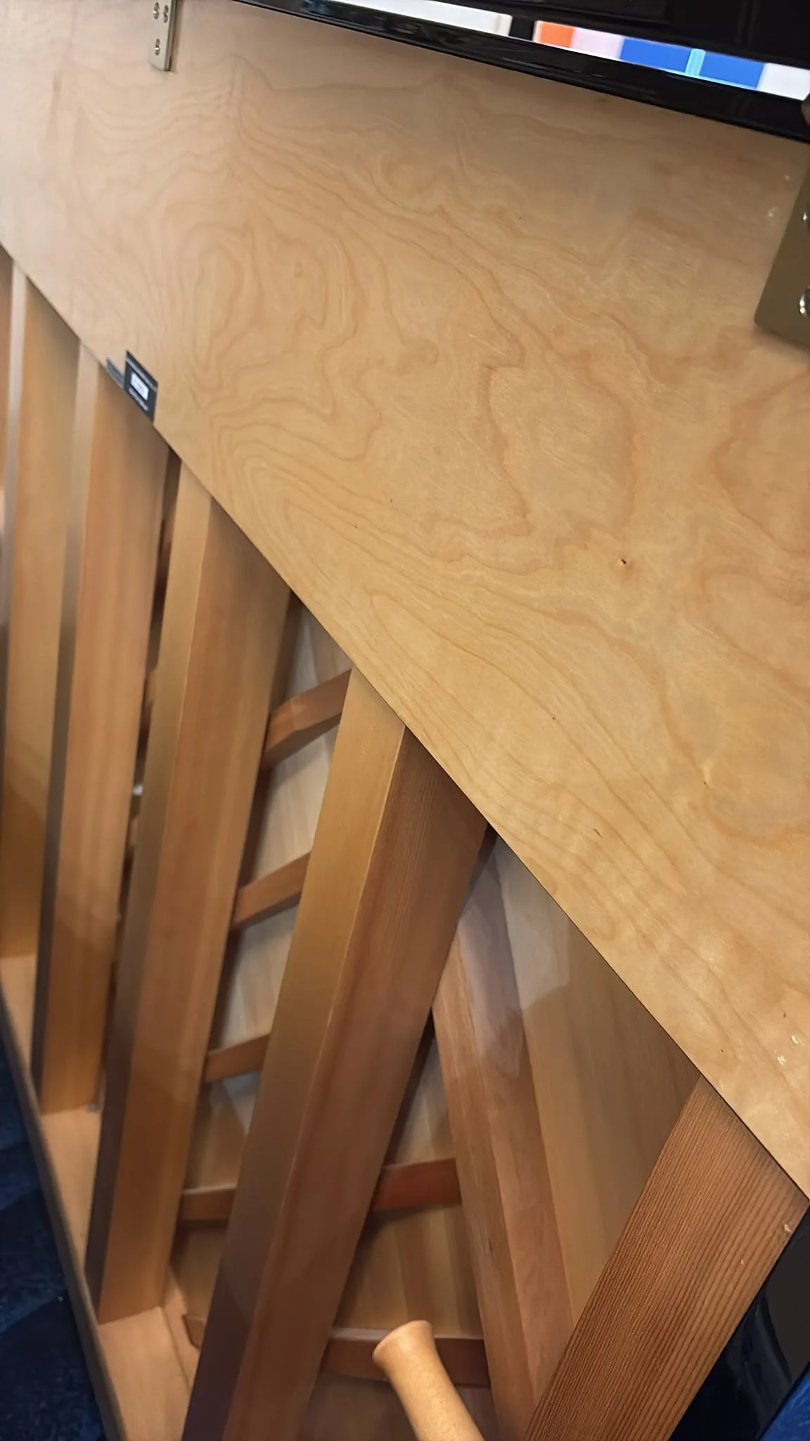 The back posts and frame of a Kawai upright piano