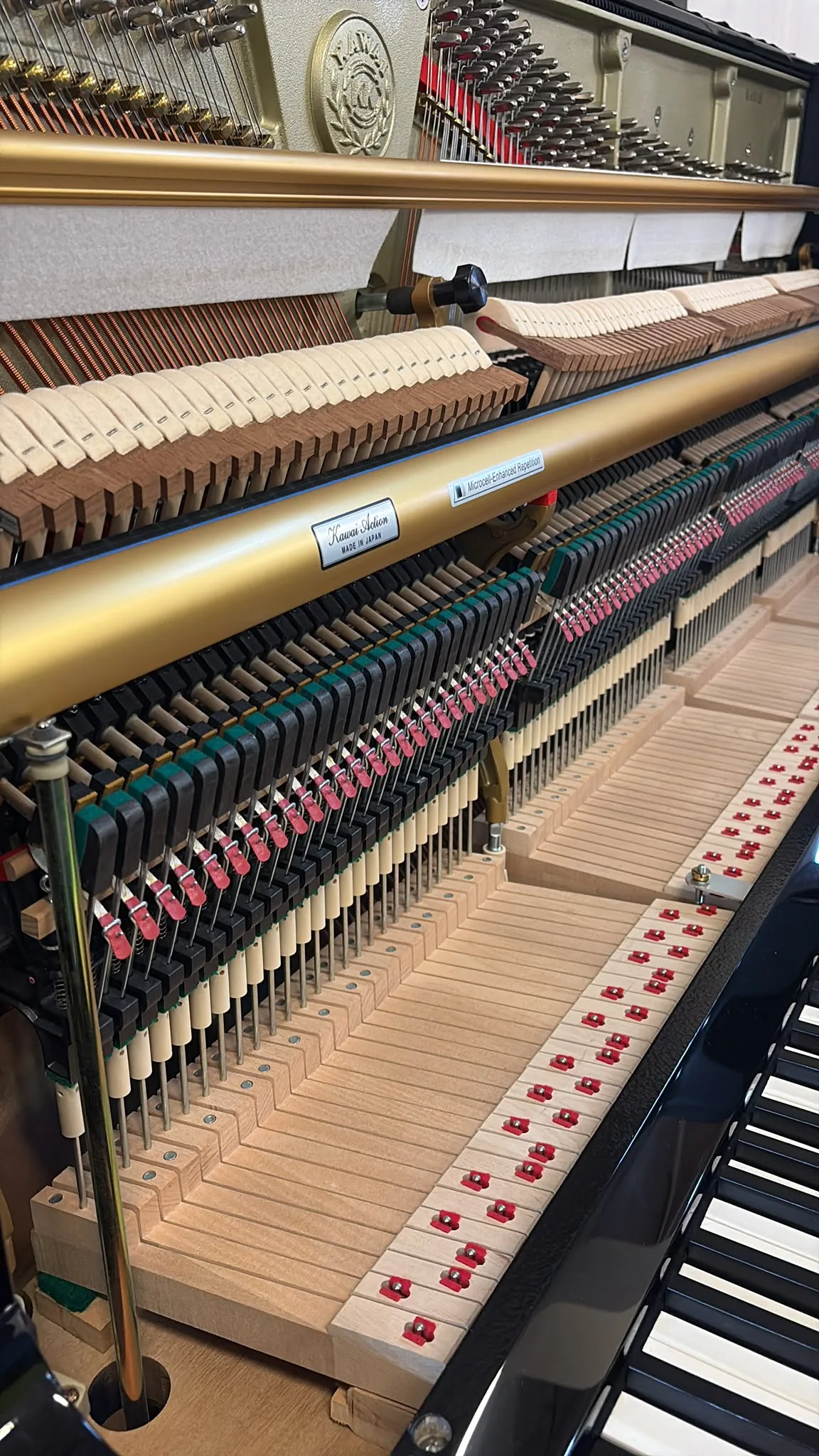 The hammers and dampers of a Kawai upright piano